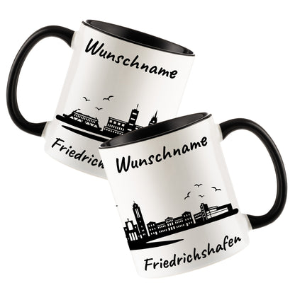Tasse in Schwarz 330ml bedruckt mit der Skyline von Friedrichshafen personalisierbar mit Wunschname