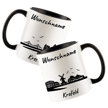 Tasse in Schwarz 330ml bedruckt mit der Skyline von Krefeld personalisierbar mit Wunschname