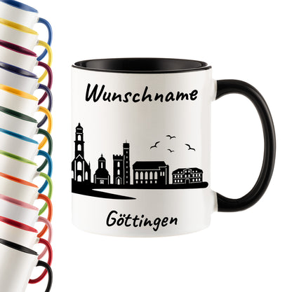 Tasse in Schwarz 330ml bedruckt mit der Skyline von Göttingen personalisierbar mit Wunschname