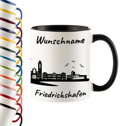 Tasse in Schwarz 330ml bedruckt mit der Skyline von Friedrichshafen personalisierbar mit Wunschname