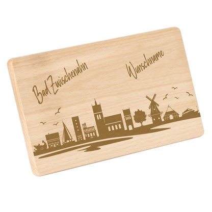 Frühstücksbrettchen 220x120mm mit Gravur mit der Skyline von Bad Zwischenahn personalisierbar mit Wunschname