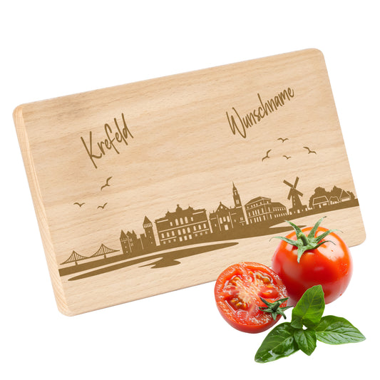 Frühstücksbrettchen 220x120mm mit Gravur mit der Skyline von Krefeld personalisierbar mit Wunschname