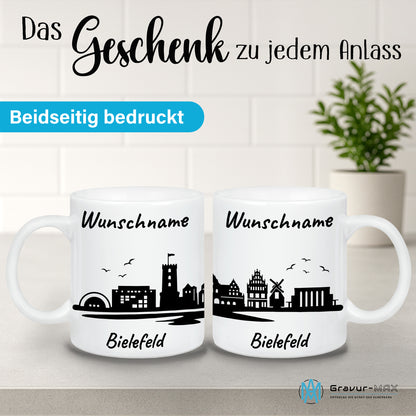Tasse in Weiß 330ml bedruckt mit der Skyline von Bielefeld personalisierbar mit Wunschname