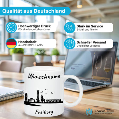 Tasse in Weiß 330ml bedruckt mit der Skyline von Freiburg personalisierbar mit Wunschname
