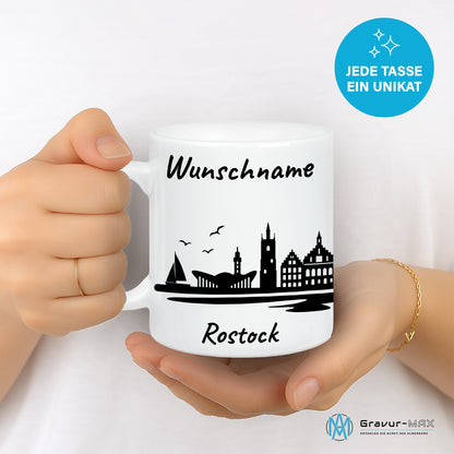 Tasse in Weiß 330ml bedruckt mit der Skyline von Rostock personalisierbar mit Wunschname