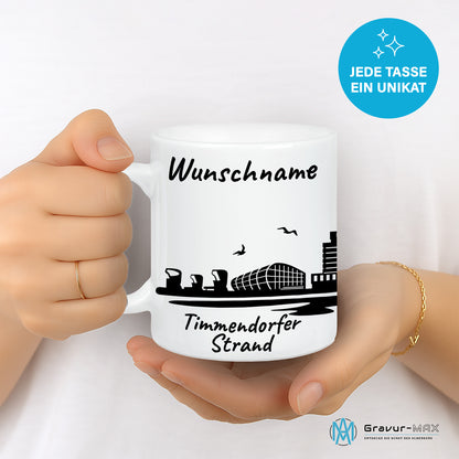 Tasse in Weiß 330ml bedruckt mit der Skyline von Timmendorfer Strand personalisierbar mit Wunschname