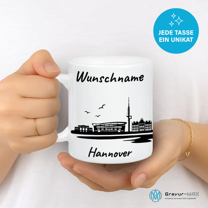 Tasse in Weiß 330ml bedruckt mit der Skyline von Hannover personalisierbar mit Wunschname