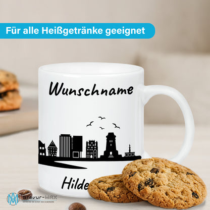 Tasse in Weiß 330ml bedruckt mit der Skyline von Hildesheim personalisierbar mit Wunschname
